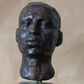 „Magdalena” – portret; materiał: brąz patynowany, drewno sosnowe; wysokość: 37cm; Rzeźba portretowa z modela wykonana w technice na wosk tracony